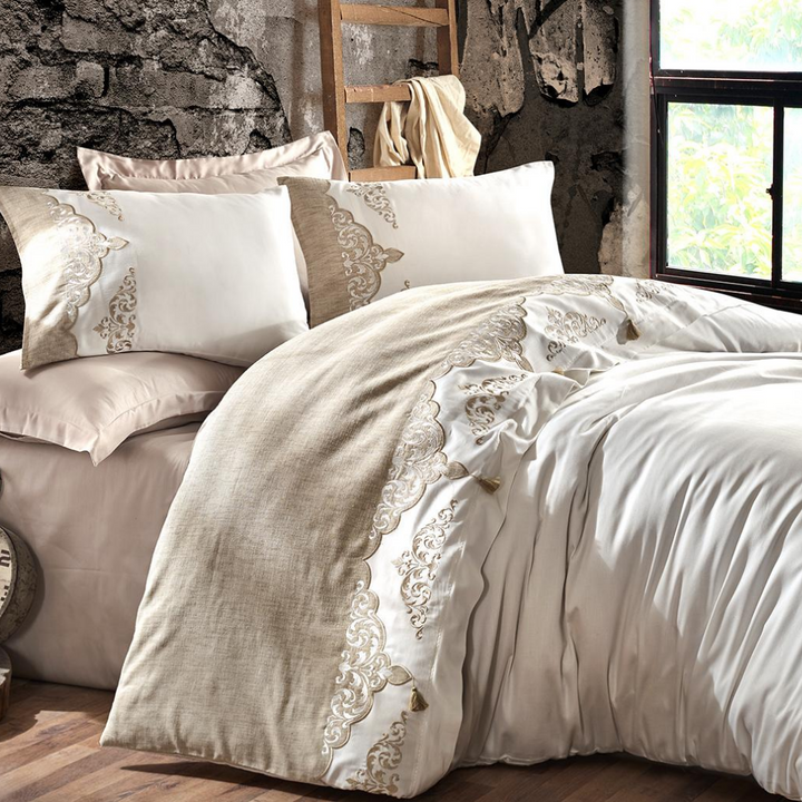 Vintage bedroom designed with a bed linen set in antique bronze color and white